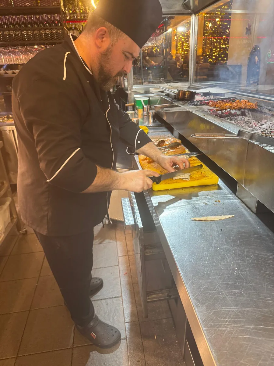 Chef Ibrahim preparing fish